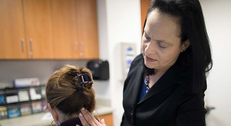 doctor treats patient